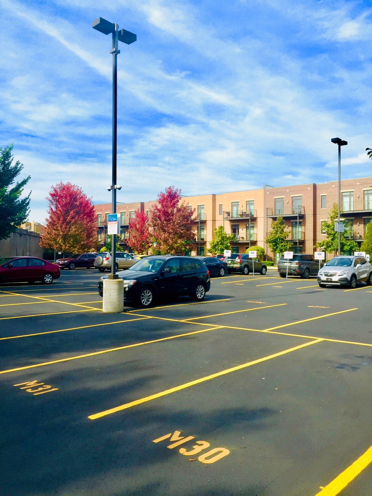a parking lot with cars parked in it