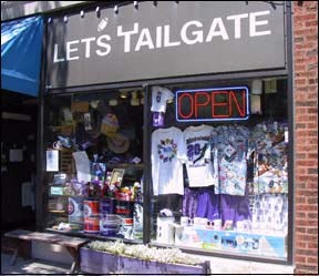 a store window with a open sign