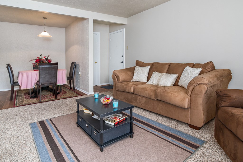 a living room with two couches and a coffee table