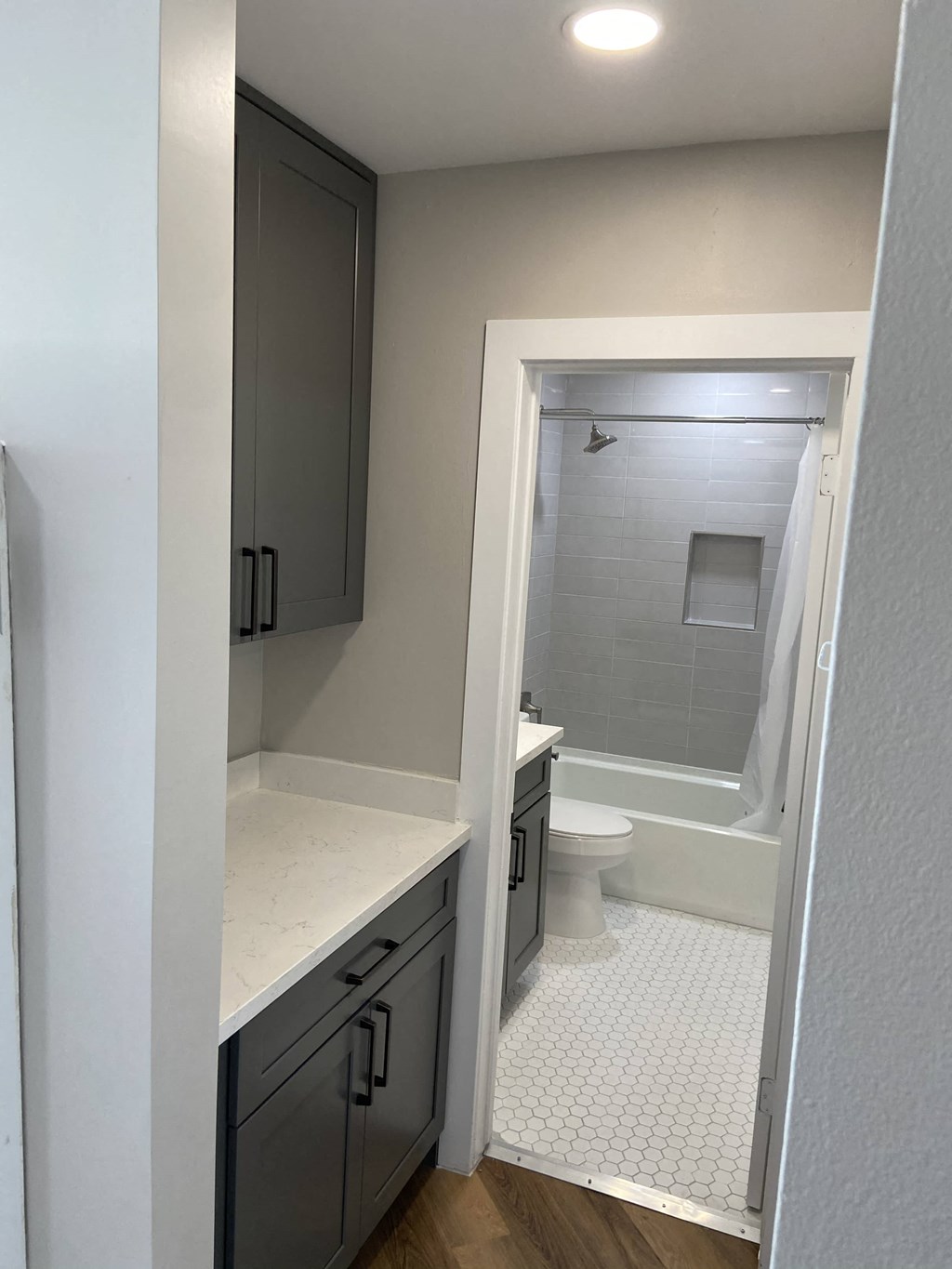 a small bathroom with a toilet and a shower