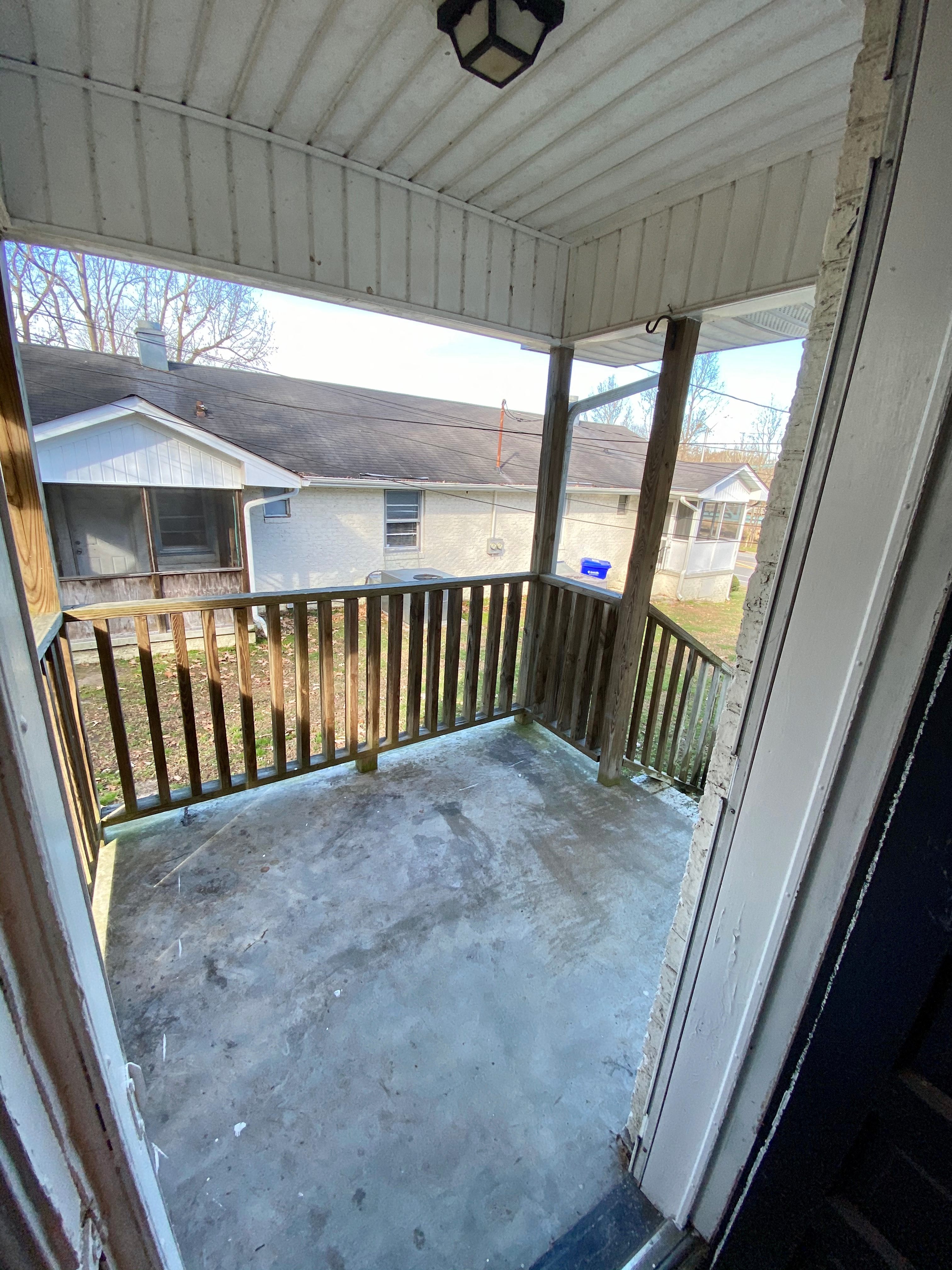 a view of the deck from the front door of a house