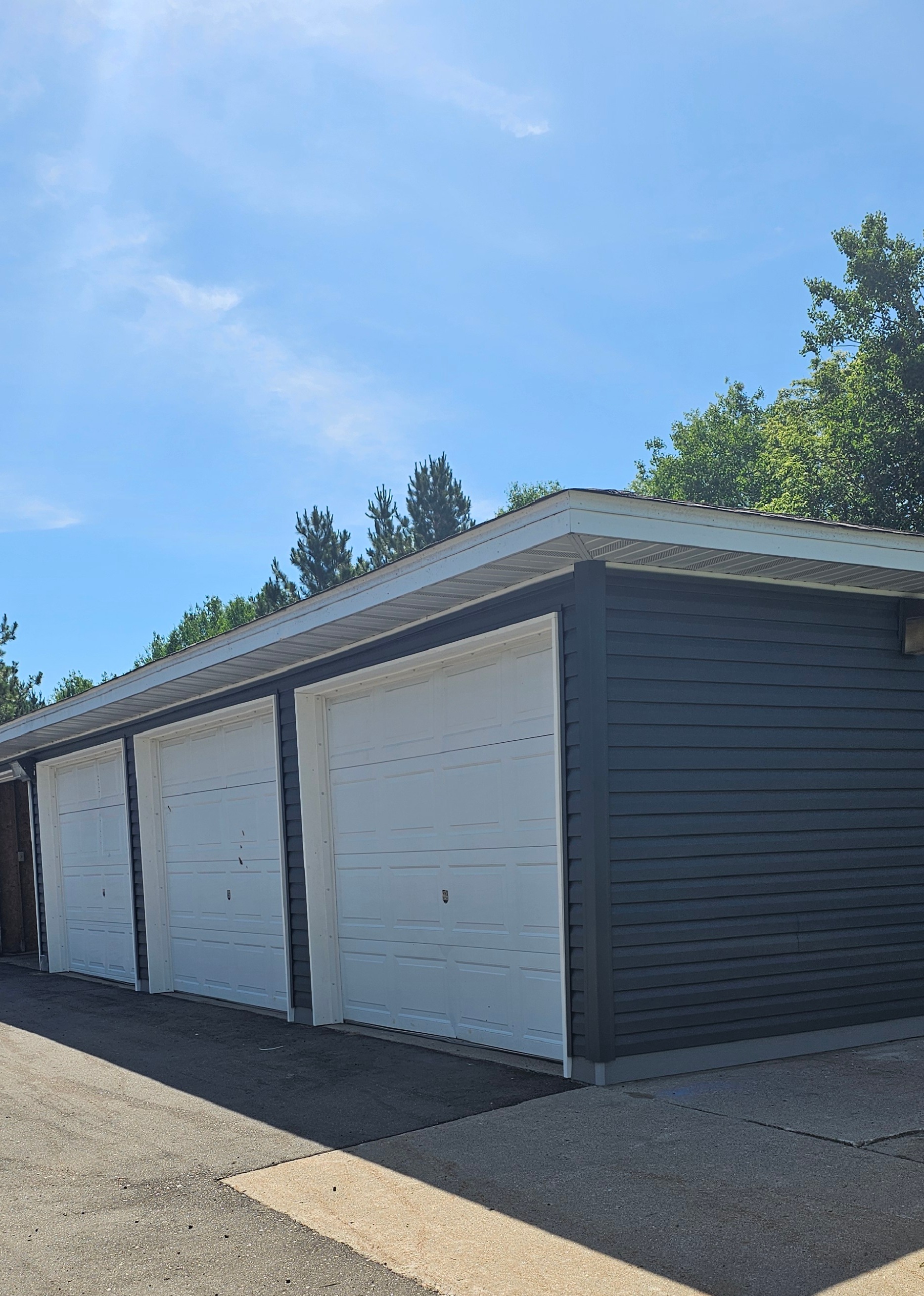 A row of garage doors are closed.