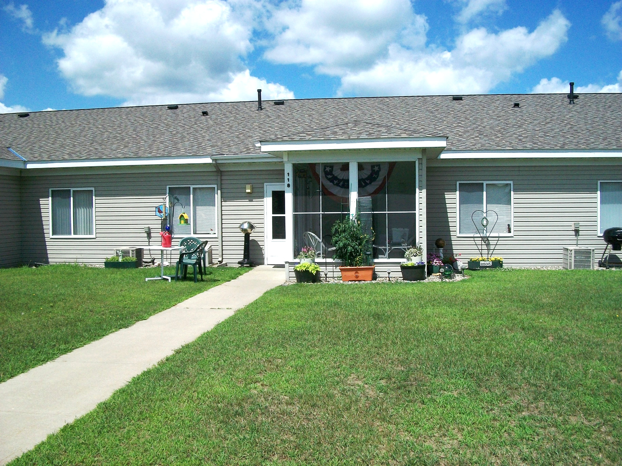 a house with a lawn in front of it