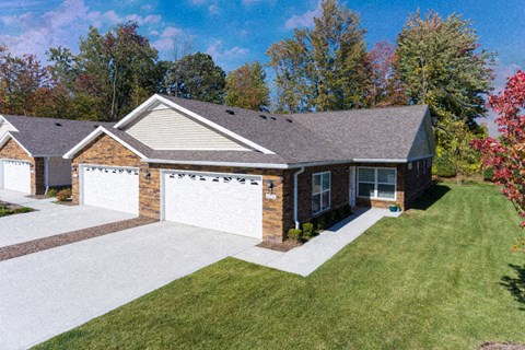 A house with a driveway and a garage.