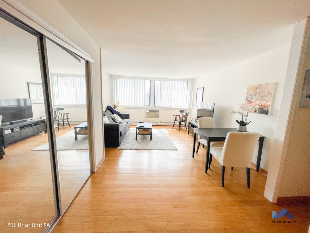 a view of the living room and dining room from the hallway