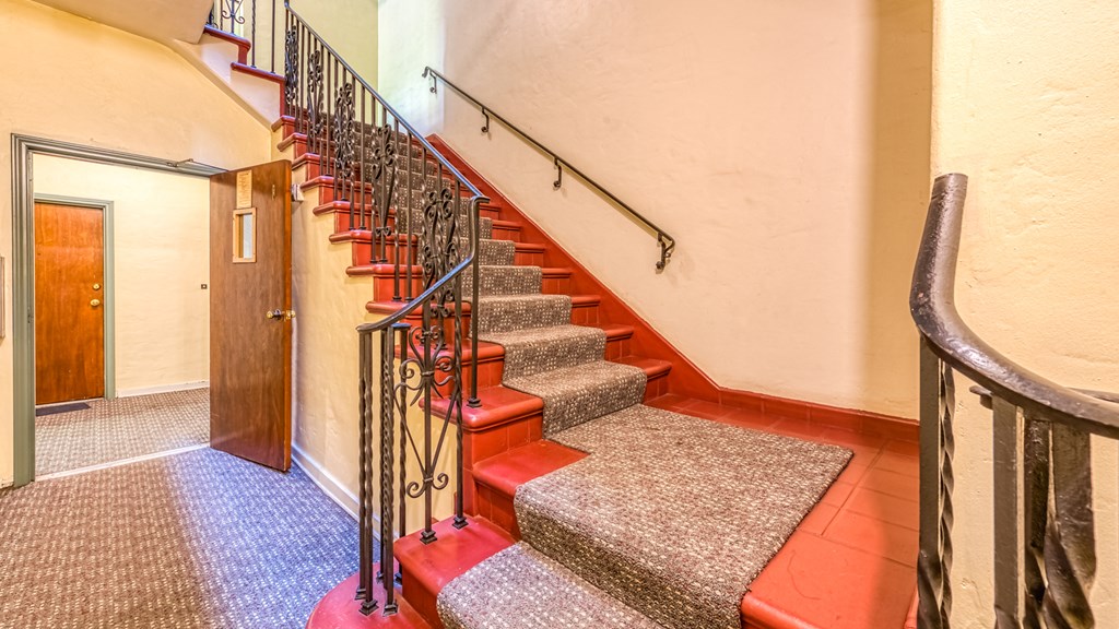 the stairs leading up to the second floor of a house