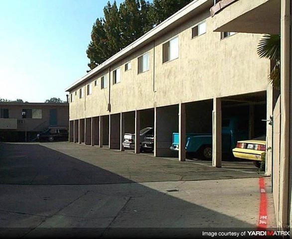 a parking garage with cars parked in it