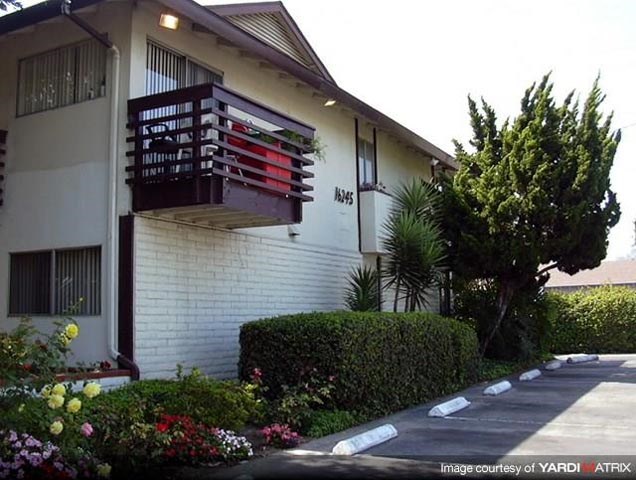 a building with a balcony on the side of it
