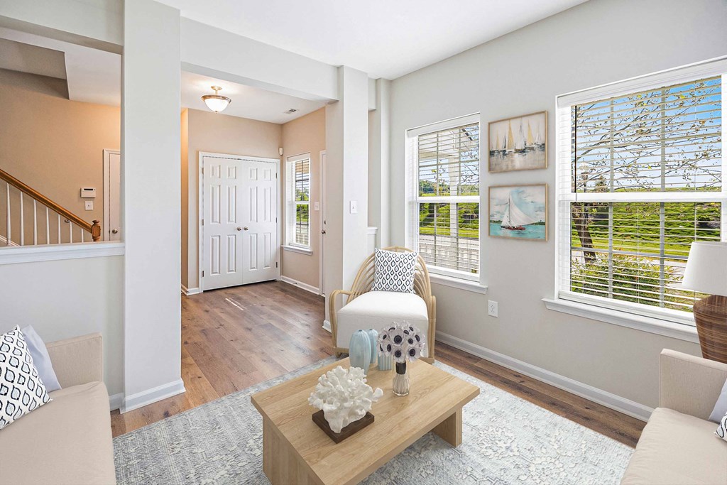 a living room with a couch and a table
