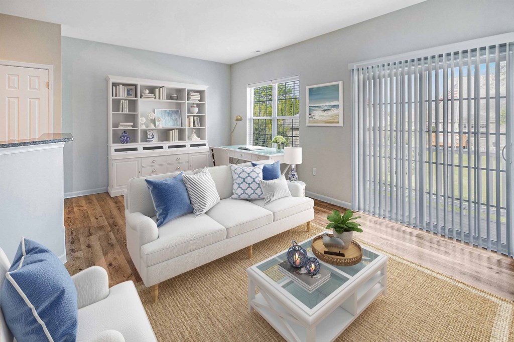 a living room with a couch and a table