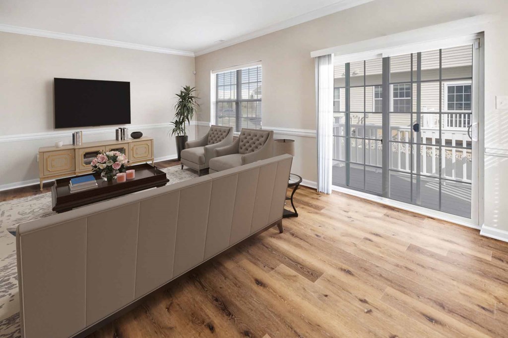 a living room with a couch and a tv