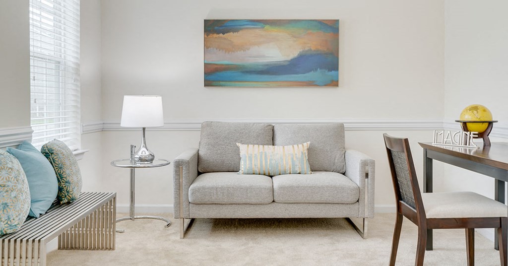 a living room with a couch and a table