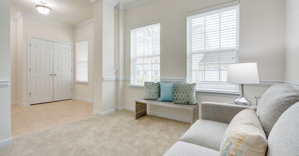 a living room with a couch and a table