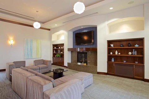 a living room with couches and a television