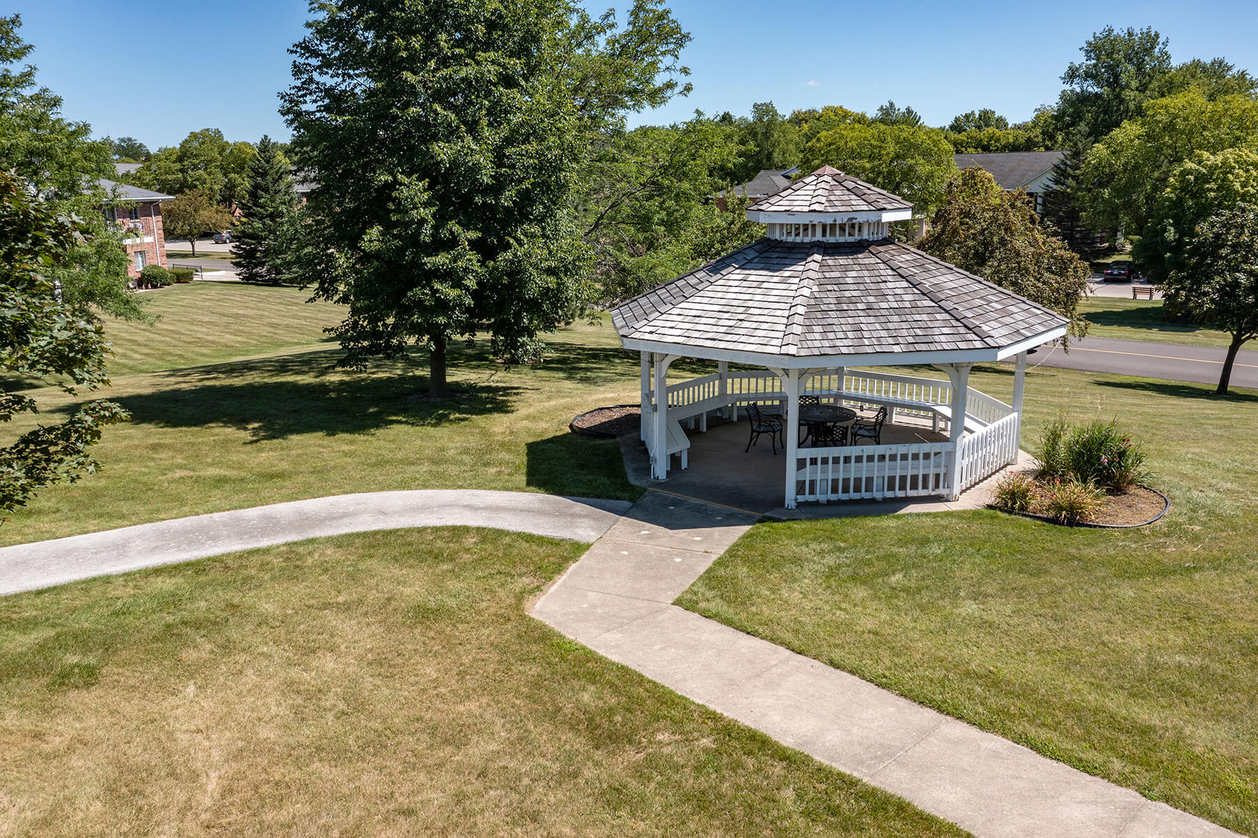 a gazebo in the middle of a park