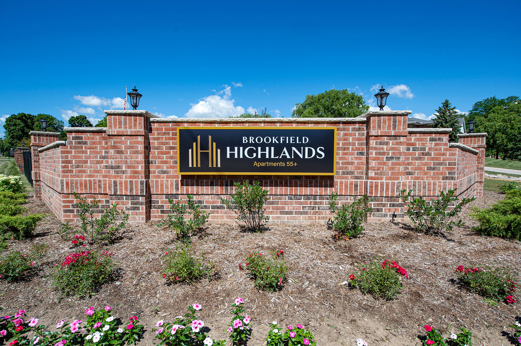 a brick wall with a sign