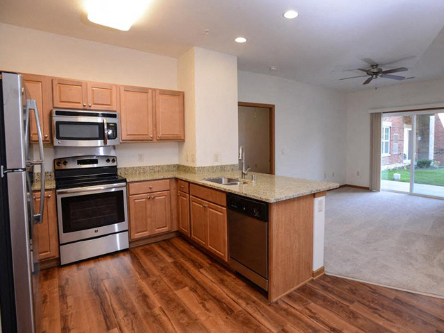 Spacious Kitchen with Pantry Cabinet at The Highlands at Mahler Park Apartments 55+, Neenah, WI,54956