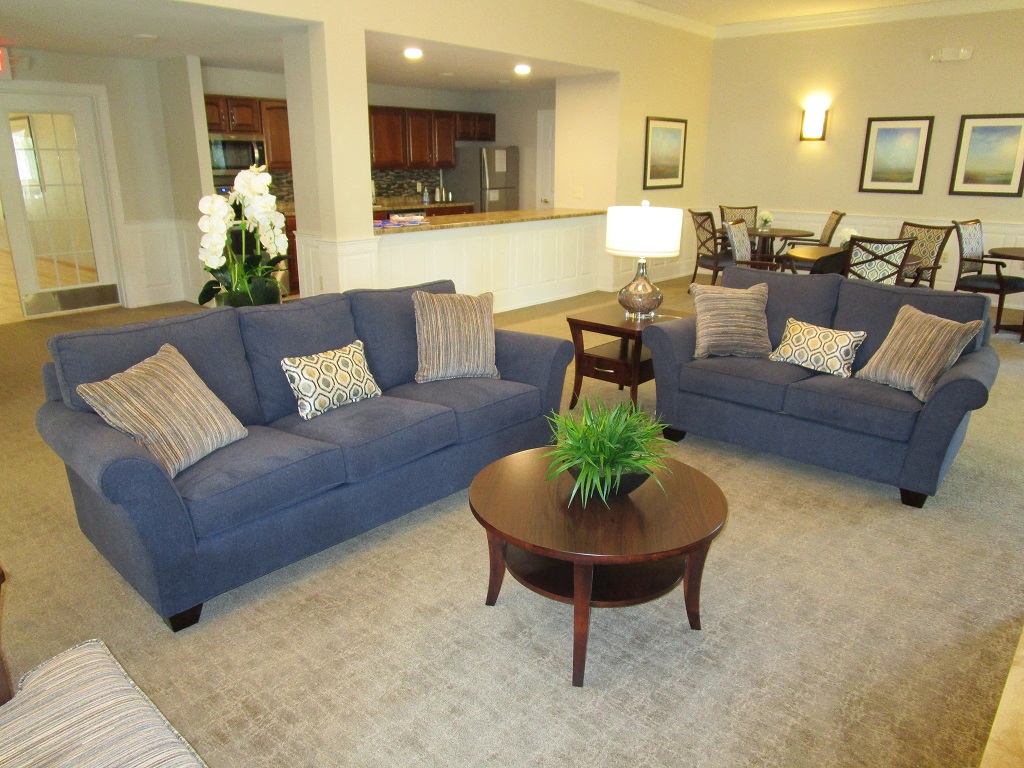 a living room with couches and a coffee table