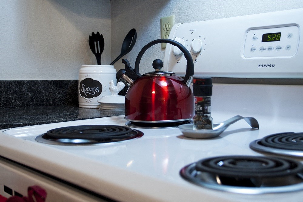 Sage Creek Apartments red tea pot on oven