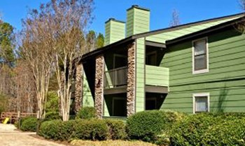 High Ridge Apartments exterior with landscaping