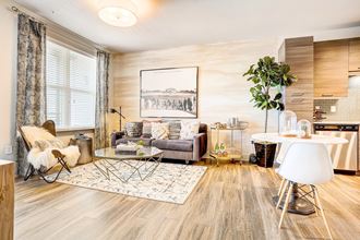 a living room with a couch and a table