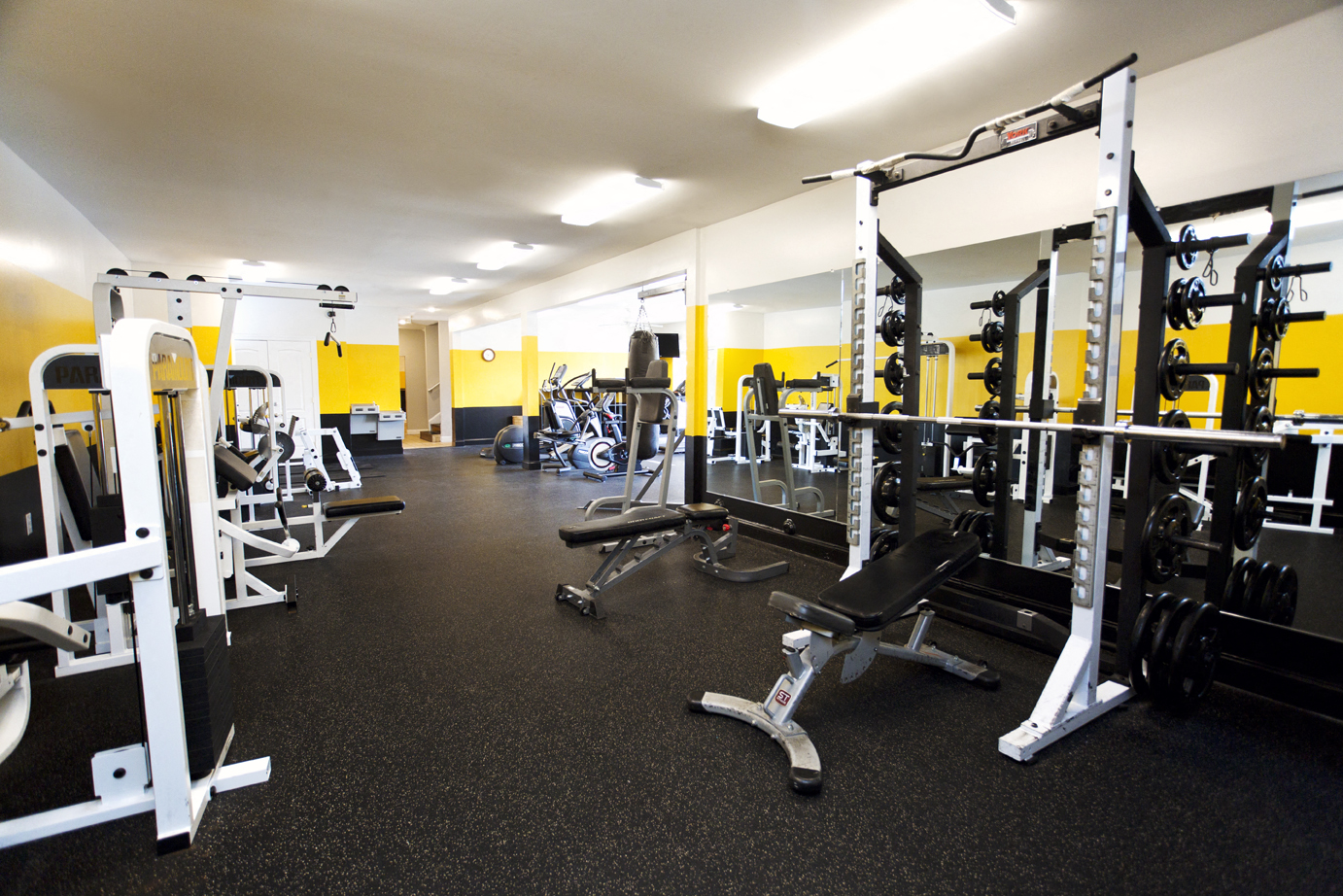 a gym with weights and other exercise equipment