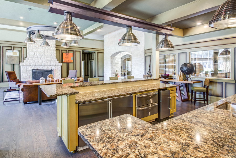 Community kitchen with mini fridge, oven, heating drawers, and sink