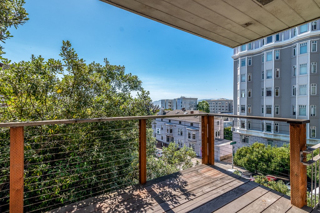 spacious balcony with city views at the district flats apartments in lenexa
