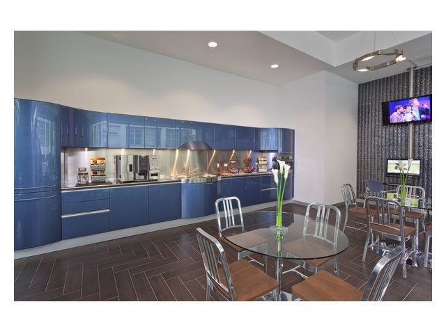 a dining room with a table and chairs
