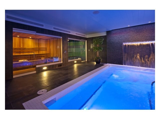 a large pool of water in an indoor spa