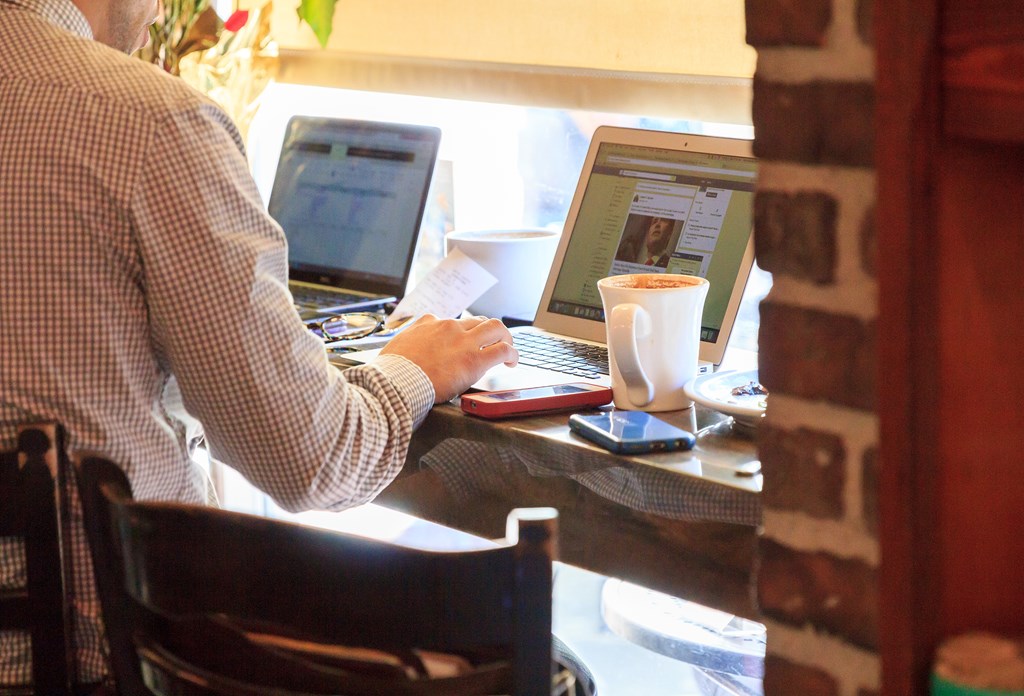 Man working at coffee shop