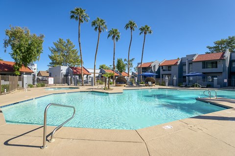 our apartments have a resort style pool with palm trees