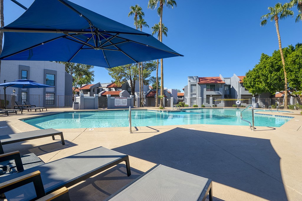 our apartments have a resort style swimming pool with umbrellas