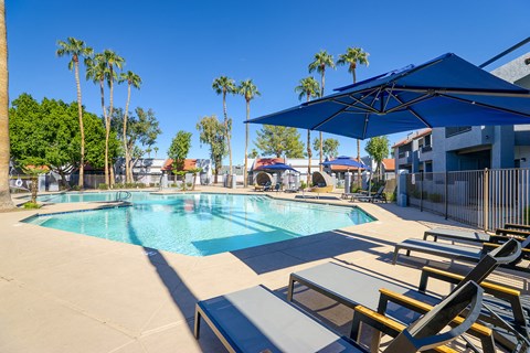 our resort style pool is next to our building and has palm trees