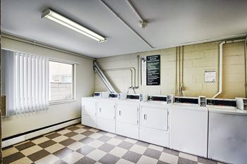 Washing clothes at Crown Pointe Apartments, Covington, KY, 41014