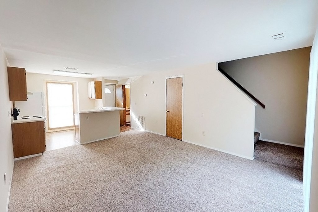Carpeted Living Area at Woodhills Apartments, West Carrollton, OH