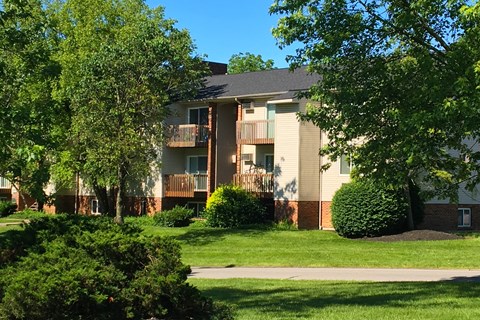 our apartments are located in a quiet neighborhood with green grass and trees1 at Oakwood Apartments, Florence