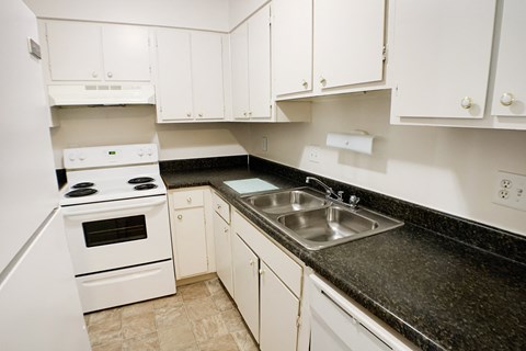 Kitchen with appliances at Oakwood Apartments, Florence, 41042