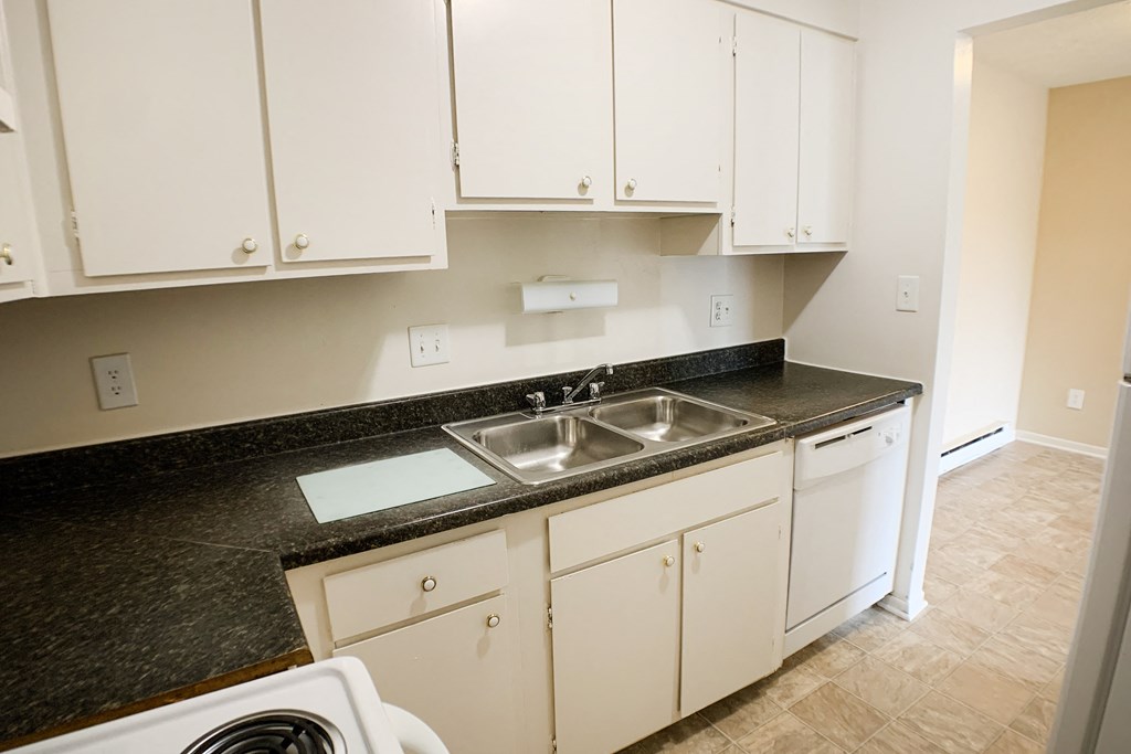 Kitchen with cabinets at Oakwood Apartments, Florence, Kentucky