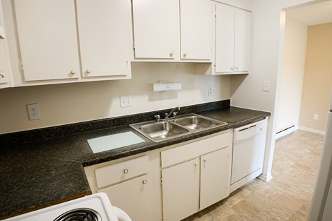 Kitchen with cabinets at Oakwood Apartments, Florence, Kentucky