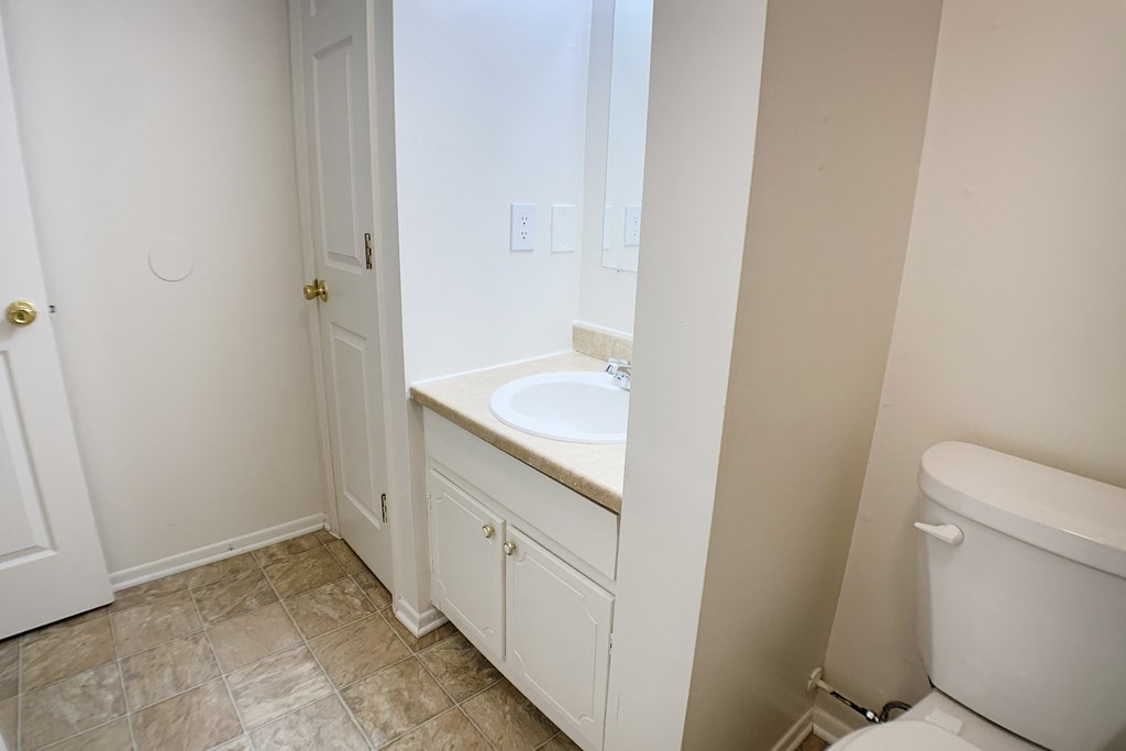 Bathroom with toilet at Oakwood Apartments, Florence