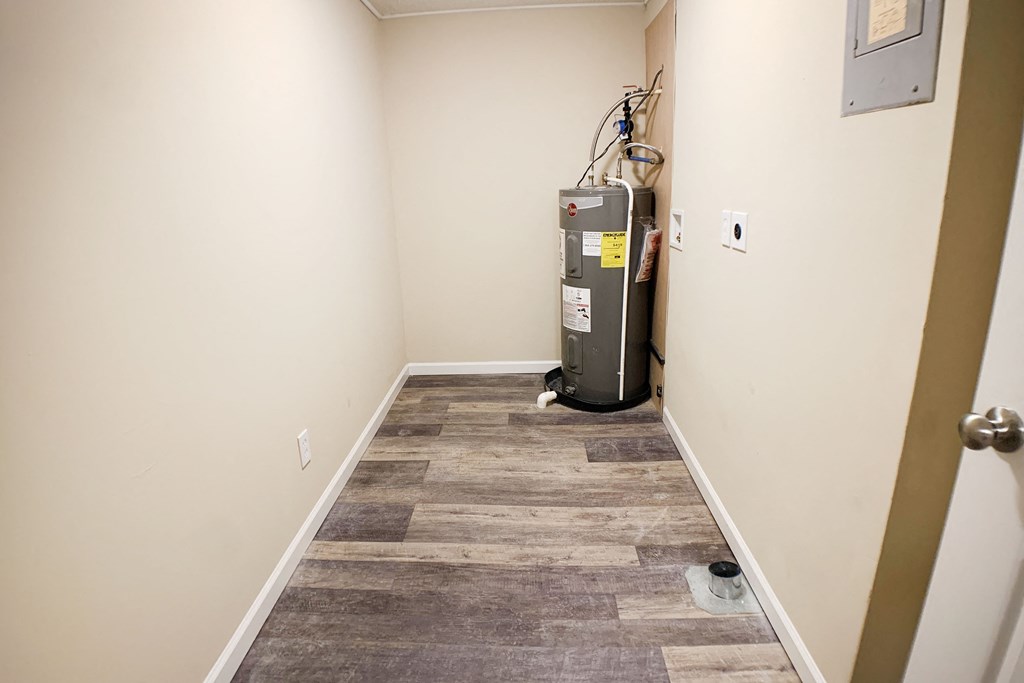 an empty room with a heater in the corner at Wentworth Estates Apartments, Florence, KY