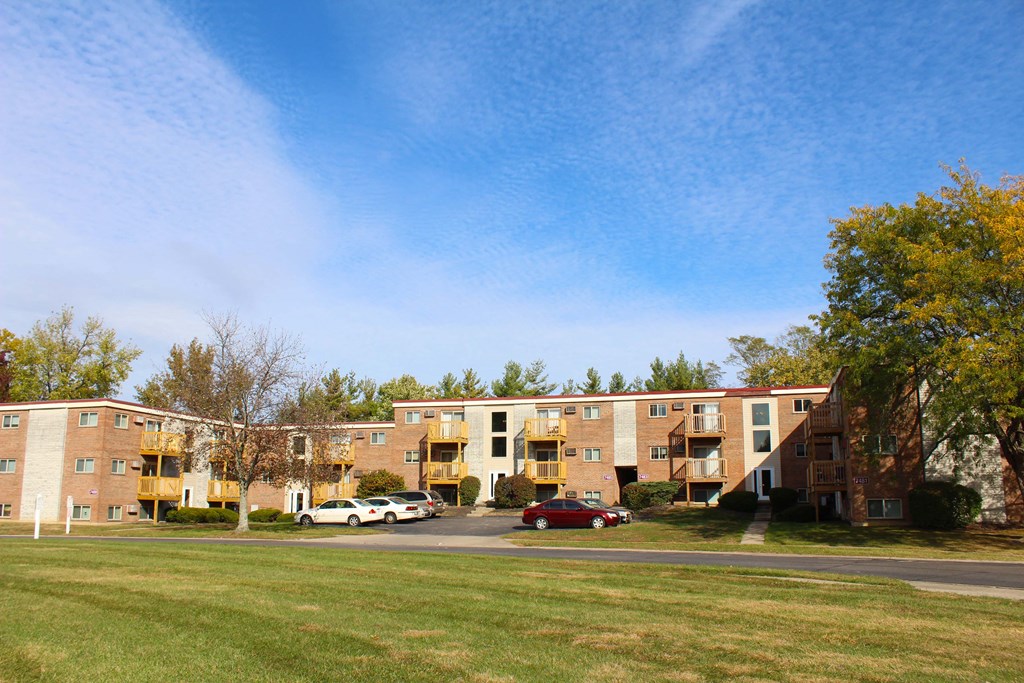 a row of brick apartment buildings on the side of a street  at Wentworth Estates Apartments, Kentucky