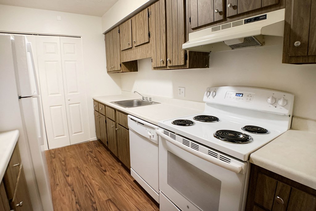 Kitchen With Custom Maple Cabinetry  at Concord Woods Apartments, Milford
