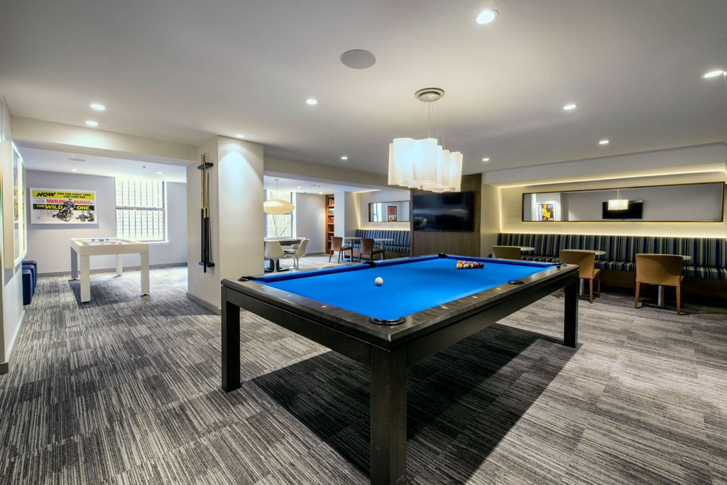 play a game of pool in our clubhouse at our apartments