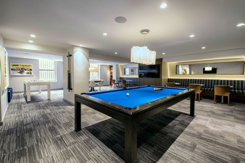 play a game of pool in our clubhouse at our apartments