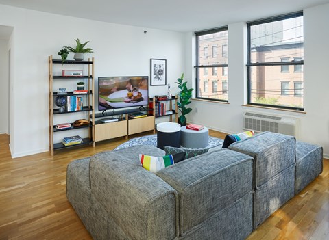 a living room with a couch and a tv