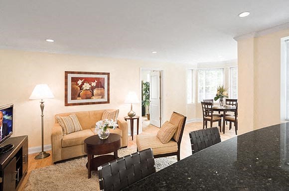 a living room with a couch and a table