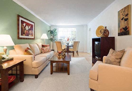 a living room with a couch and a table