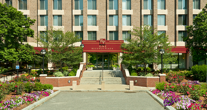 a large building with a staircase in front of it
